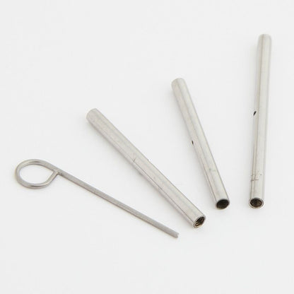 Bild vom Packungsinhalt. 3 Seilverbinder und Seilschlüssel aus Metall