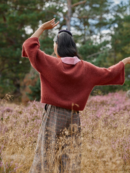 Oversized Pullover mit rosa Polokragen